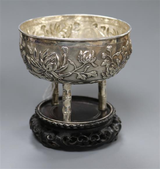 A late 19th/early 20th century Chinese white metal incense burner by Tuck Chang & Co, on hardwood stand, overall height 11.9cm.